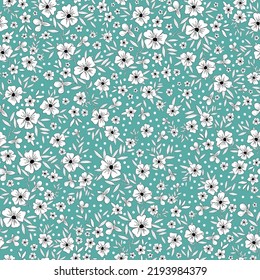 Seamless floral pattern. small white flowers and leaves. blue  background. 