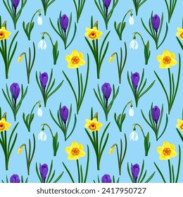 Seamless floral pattern with spring flowers on a blue background.