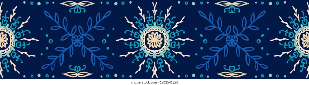 Seamless floral pattern. Stylized doodle flowers. Spanish ethnic embroidery. Folk ornament. Solar sign. Mediterranean print. Indian Oriental or Turkish textiles.  Boho wallpaper. Hipster  art.