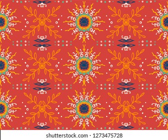 Seamless floral pattern. Stylized doodle flowers. Spanish ethnic embroidery. Folk ornament. Solar sign. Mediterranean print. Indian Oriental or Turkish textiles. Boho wallpaper. Hipster art.