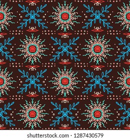Seamless floral pattern. Stylized doodle flowers. Spanish ethnic embroidery. Folk ornament. Solar sign. Mediterranean print. Indian Oriental or Turkish textiles. Boho wallpaper. Hipster art.