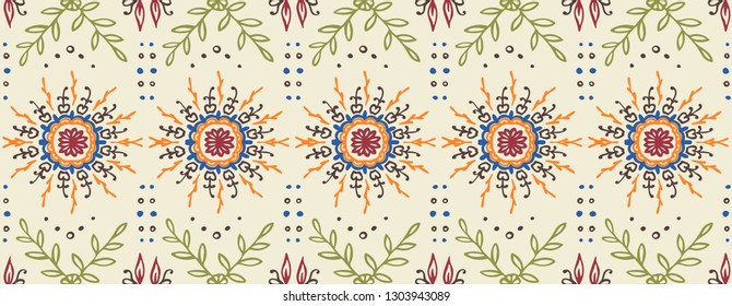Seamless floral pattern. Stylized doodle flowers. Spanish ethnic embroidery. Folk ornament. Solar sign. Mediterranean print. Indian Oriental or Turkish textiles. Boho wallpaper. Hipster art.