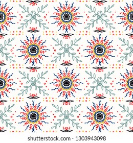 Seamless floral pattern. Stylized doodle flowers. Spanish ethnic embroidery. Folk ornament. Solar sign. Mediterranean print. Indian Oriental or Turkish textiles. Boho wallpaper. Hipster art.