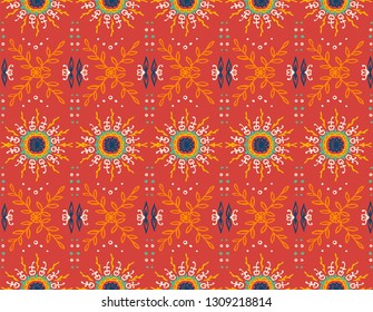 Seamless floral pattern. Stylized doodle flowers. Spanish ethnic embroidery. Folk ornament. Solar sign. Mediterranean print. Indian Oriental or Turkish textiles.  Boho wallpaper. Hipster  art.