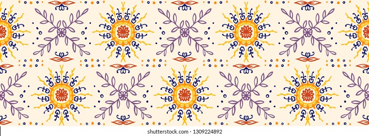 Seamless floral pattern. Stylized doodle flowers. Spanish ethnic embroidery. Folk ornament. Solar sign. Mediterranean print. Indian Oriental or Turkish textiles.  Boho wallpaper. Hipster  art.