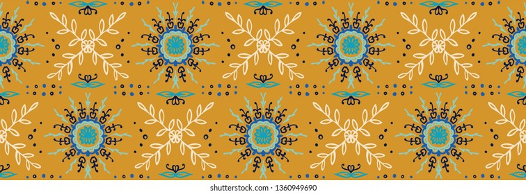 Seamless floral pattern. Stylized doodle flowers. Spanish ethnic embroidery. Folk ornament. Solar sign. Mediterranean print. Indian Oriental or Turkish textiles.  Boho wallpaper. Hipster  art.