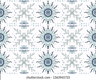 Seamless floral pattern. Stylized doodle flowers. Spanish ethnic embroidery. Folk ornament. Solar sign. Mediterranean print. Indian Oriental or Turkish textiles.  Boho wallpaper. Hipster  art.
