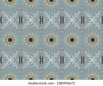 Seamless floral pattern. Stylized doodle flowers. Spanish ethnic embroidery. Folk ornament. Solar sign. Mediterranean print. Indian Oriental or Turkish textiles.  Boho wallpaper. Hipster  art.