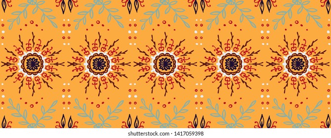 Seamless floral pattern. Stylized doodle flowers. Spanish ethnic embroidery. Folk ornament. Solar sign. Mediterranean print. Indian Oriental or Turkish textiles. Boho wallpaper. Hipster art.