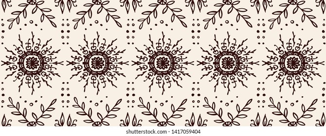 Seamless floral pattern. Stylized doodle flowers. Spanish ethnic embroidery. Folk ornament. Solar sign. Mediterranean print. Indian Oriental or Turkish textiles. Boho wallpaper. Hipster art.