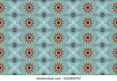 Seamless floral pattern. Stylized doodle flowers. Spanish ethnic embroidery. Folk ornament. Solar sign. Mediterranean print. Indian Oriental or Turkish textiles. Boho wallpaper. Hipster art.