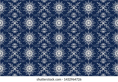 Seamless floral pattern. Stylized doodle flowers. Spanish ethnic embroidery. Folk ornament. Solar sign. Mediterranean print. Indian Oriental or Turkish textiles. Boho wallpaper. Hipster art.