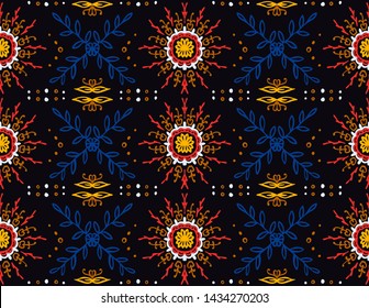 Seamless floral pattern. Stylized doodle flowers. Spanish ethnic embroidery. Folk ornament. Solar sign. Mediterranean print. Indian Oriental or Turkish textiles. Boho wallpaper. Hipster art.