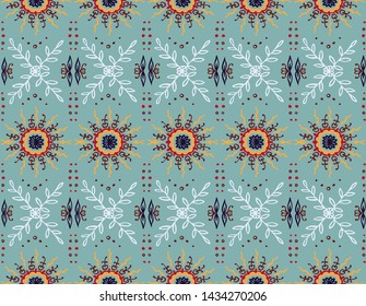 Seamless floral pattern. Stylized doodle flowers. Spanish ethnic embroidery. Folk ornament. Solar sign. Mediterranean print. Indian Oriental or Turkish textiles. Boho wallpaper. Hipster art.