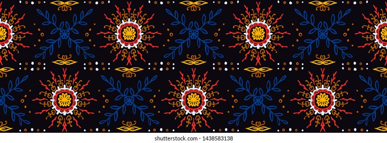 Seamless floral pattern. Stylized doodle flowers. Spanish ethnic embroidery. Folk ornament. Solar sign. Mediterranean print. Indian Oriental or Turkish textiles. Boho wallpaper. Hipster art.