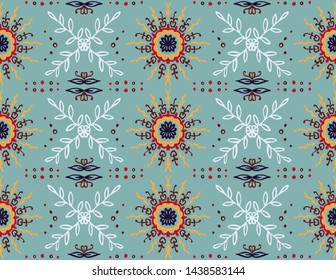 Seamless floral pattern. Stylized doodle flowers. Spanish ethnic embroidery. Folk ornament. Solar sign. Mediterranean print. Indian Oriental or Turkish textiles. Boho wallpaper. Hipster art.