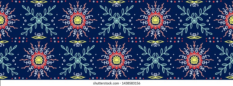 Seamless floral pattern. Stylized doodle flowers. Spanish ethnic embroidery. Folk ornament. Solar sign. Mediterranean print. Indian Oriental or Turkish textiles. Boho wallpaper. Hipster art.