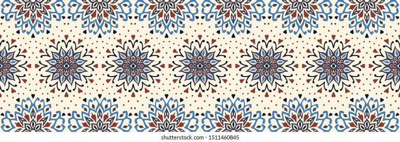 Seamless floral pattern. Stylized doodle flowers. Spanish ethnic embroidery. Folk ornament. Solar sign. Mediterranean print. Indian Oriental or Turkish textiles. Boho wallpaper. Hipster art.