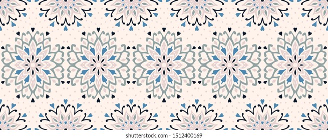 Seamless floral pattern. Stylized doodle flowers. Spanish ethnic embroidery. Folk ornament. Solar sign. Mediterranean print. Indian Oriental or Turkish textiles. Boho wallpaper. Hipster art.