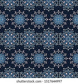 Seamless floral pattern. Stylized doodle flowers. Spanish ethnic embroidery. Folk ornament. Solar sign. Mediterranean print. Indian Oriental or Turkish textiles. Boho wallpaper. Hipster art.