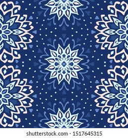 Seamless floral pattern. Stylized doodle flowers. Spanish ethnic embroidery. Folk ornament. Solar sign. Mediterranean print. Indian Oriental or Turkish textiles. Boho wallpaper. Hipster art.