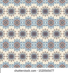 Seamless floral pattern. Stylized doodle flowers. Spanish ethnic embroidery. Folk ornament. Solar sign. Mediterranean print. Indian Oriental or Turkish textiles. Boho wallpaper. Hipster art.