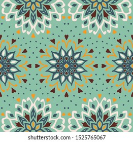 Seamless floral pattern. Stylized doodle flowers. Spanish ethnic embroidery. Folk ornament. Solar sign. Mediterranean print. Indian Oriental or Turkish textiles. Boho wallpaper. Hipster art.