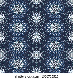 Seamless floral pattern. Stylized doodle flowers. Spanish ethnic embroidery. Folk ornament. Solar sign. Mediterranean print. Indian Oriental or Turkish textiles. Boho wallpaper. Hipster art.