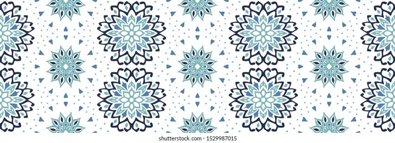 Seamless floral pattern. Stylized doodle flowers. Spanish ethnic embroidery. Folk ornament. Solar sign. Mediterranean print. Indian Oriental or Turkish textiles. Boho wallpaper. Hipster art.