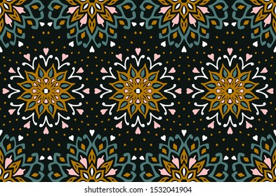 Seamless floral pattern. Stylized doodle flowers. Spanish ethnic embroidery. Folk ornament. Solar sign. Mediterranean print. Indian Oriental or Turkish textiles. Boho wallpaper. Hipster art.