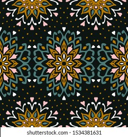 Seamless floral pattern. Stylized doodle flowers. Spanish ethnic embroidery. Folk ornament. Solar sign. Mediterranean print. Indian Oriental or Turkish textiles. Boho wallpaper. Hipster art.