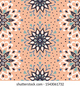 Seamless floral pattern. Stylized doodle flowers. Spanish ethnic embroidery. Folk ornament. Solar sign. Mediterranean print. Indian Oriental or Turkish textiles. Boho wallpaper. Hipster art.