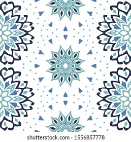 Seamless floral pattern. Stylized doodle flowers. Spanish ethnic embroidery. Folk ornament. Solar sign. Mediterranean print. Indian Oriental or Turkish textiles. Boho wallpaper. Hipster art.