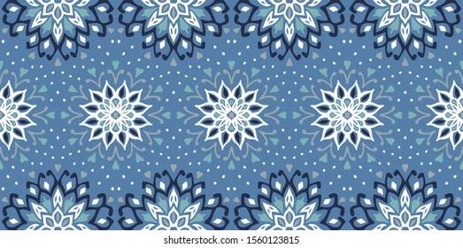 Seamless floral pattern. Stylized doodle flowers. Spanish ethnic embroidery. Folk ornament. Solar sign. Mediterranean print. Indian Oriental or Turkish textiles. Boho wallpaper. Hipster art.