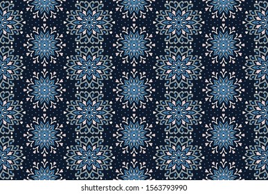 Seamless floral pattern. Stylized doodle flowers. Spanish ethnic embroidery. Folk ornament. Solar sign. Mediterranean print. Indian Oriental or Turkish textiles. Boho wallpaper. Hipster art.