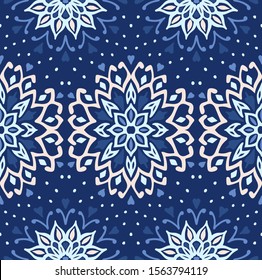 Seamless floral pattern. Stylized doodle flowers. Spanish ethnic embroidery. Folk ornament. Solar sign. Mediterranean print. Indian Oriental or Turkish textiles. Boho wallpaper. Hipster art.