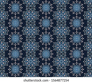 Seamless floral pattern. Stylized doodle flowers. Spanish ethnic embroidery. Folk ornament. Solar sign. Mediterranean print. Indian Oriental or Turkish textiles. Boho wallpaper. Hipster art.
