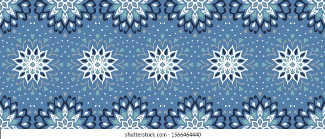 Seamless floral pattern. Stylized doodle flowers. Spanish ethnic embroidery. Folk ornament. Solar sign. Mediterranean print. Indian Oriental or Turkish textiles. Boho wallpaper. Hipster art.