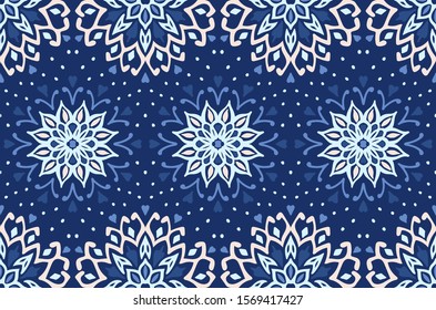 Seamless floral pattern. Stylized doodle flowers. Spanish ethnic embroidery. Folk ornament. Solar sign. Mediterranean print. Indian Oriental or Turkish textiles. Boho wallpaper. Hipster art.