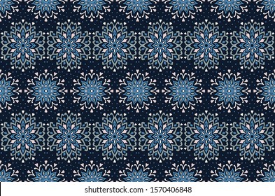 Seamless floral pattern. Stylized doodle flowers. Spanish ethnic embroidery. Folk ornament. Solar sign. Mediterranean print. Indian Oriental or Turkish textiles. Boho wallpaper. Hipster art.
