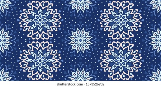 Seamless floral pattern. Stylized doodle flowers. Spanish ethnic embroidery. Folk ornament. Solar sign. Mediterranean print. Indian Oriental or Turkish textiles. Boho wallpaper. Hipster art.