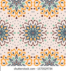 Seamless floral pattern. Stylized doodle flowers. Spanish ethnic embroidery. Folk ornament. Solar sign. Mediterranean print. Indian Oriental or Turkish textiles. Boho wallpaper. Hipster art.