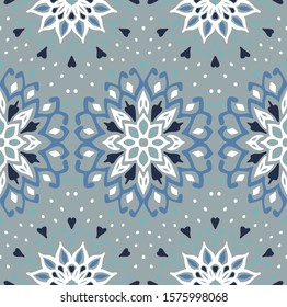Seamless floral pattern. Stylized doodle flowers. Spanish ethnic embroidery. Folk ornament. Solar sign. Mediterranean print. Indian Oriental or Turkish textiles. Boho wallpaper. Hipster art.