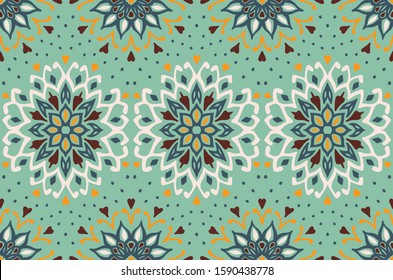 Seamless floral pattern. Stylized doodle flowers. Spanish ethnic embroidery. Folk ornament. Solar sign. Mediterranean print. Indian Oriental or Turkish textiles. Boho wallpaper. Hipster art.