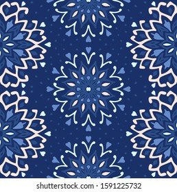 Seamless floral pattern. Stylized doodle flowers. Spanish ethnic embroidery. Folk ornament. Solar sign. Mediterranean print. Indian Oriental or Turkish textiles. Boho wallpaper. Hipster art.