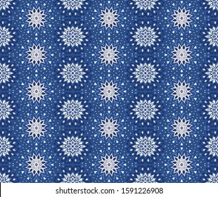 Seamless floral pattern. Stylized doodle flowers. Spanish ethnic embroidery. Folk ornament. Solar sign. Mediterranean print. Indian Oriental or Turkish textiles. Boho wallpaper. Hipster art.
