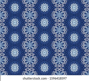 Seamless floral pattern. Stylized doodle flowers. Spanish ethnic embroidery. Folk ornament. Solar sign. Mediterranean print. Indian Oriental or Turkish textiles. Boho wallpaper. Hipster art.