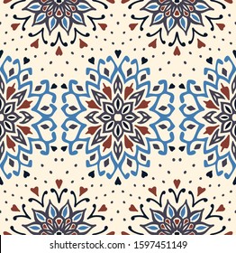 Seamless floral pattern. Stylized doodle flowers. Spanish ethnic embroidery. Folk ornament. Solar sign. Mediterranean print. Indian Oriental or Turkish textiles. Boho wallpaper. Hipster art.