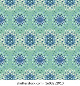 Seamless floral pattern. Stylized doodle flowers. Spanish ethnic embroidery. Folk ornament. Solar sign. Mediterranean print. Indian Oriental or Turkish textiles. Boho wallpaper. Hipster art.