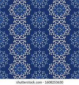 Seamless floral pattern. Stylized doodle flowers. Spanish ethnic embroidery. Folk ornament. Solar sign. Mediterranean print. Indian Oriental or Turkish textiles. Boho wallpaper. Hipster art.